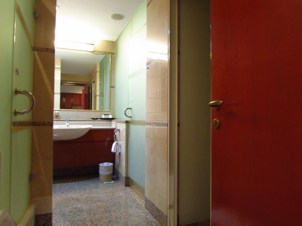 Alocassia Serviced Apartments Singapura Bilik gambar